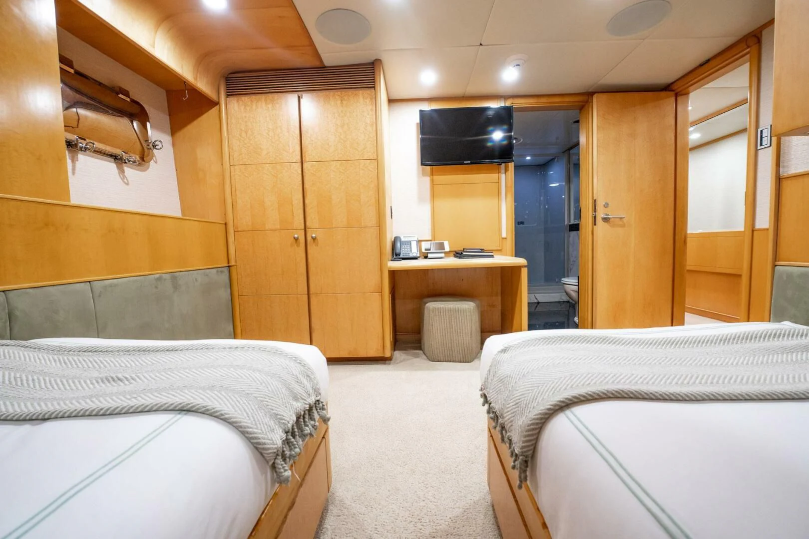 a room with two beds aboard ISLAND HEIRESS Yacht for Charter