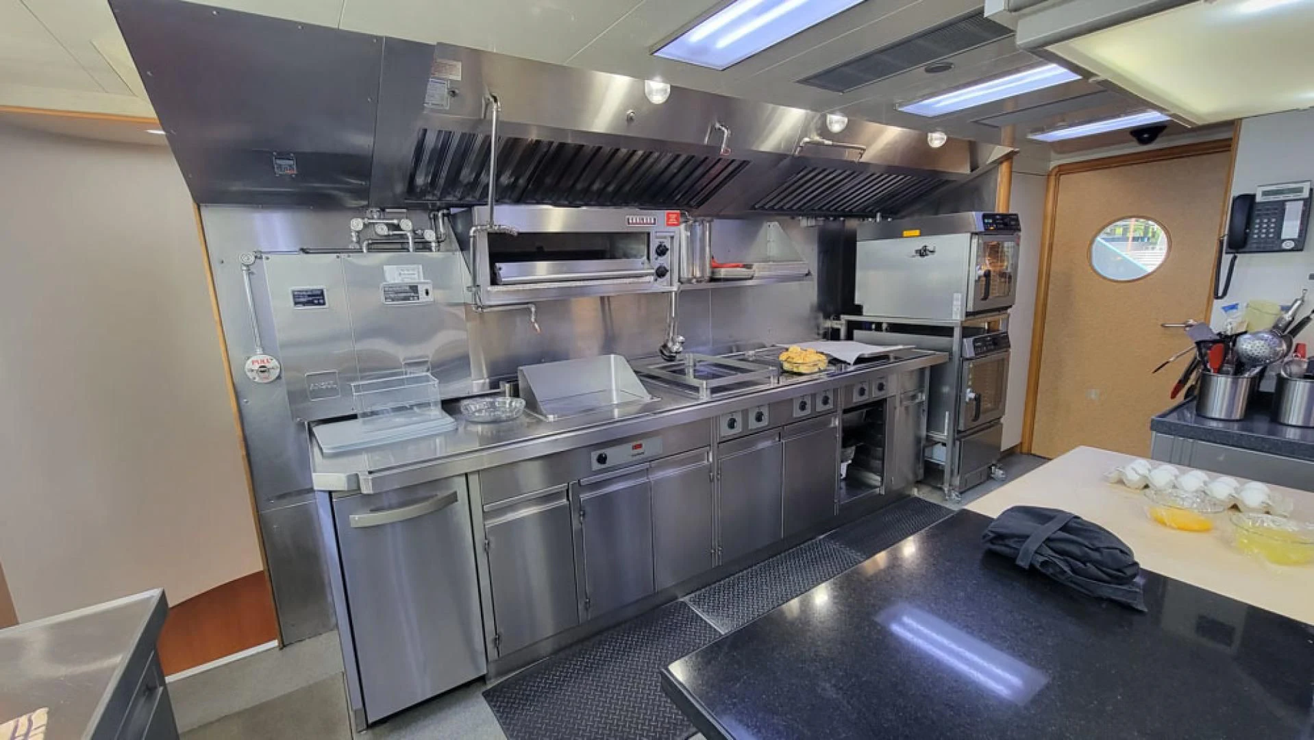 a kitchen with stainless steel appliances aboard ISLAND HEIRESS Yacht for Charter