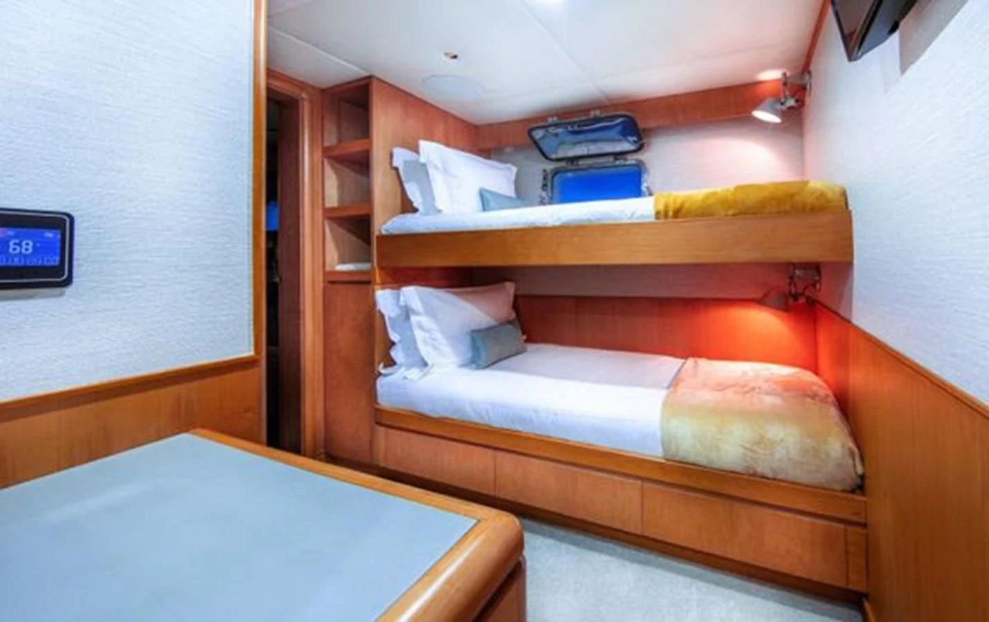 a bed in a room aboard ISLAND HEIRESS Yacht for Charter