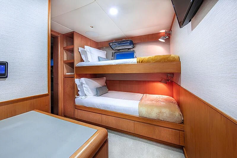 a bed in a room aboard ISLAND HEIRESS Yacht for Charter