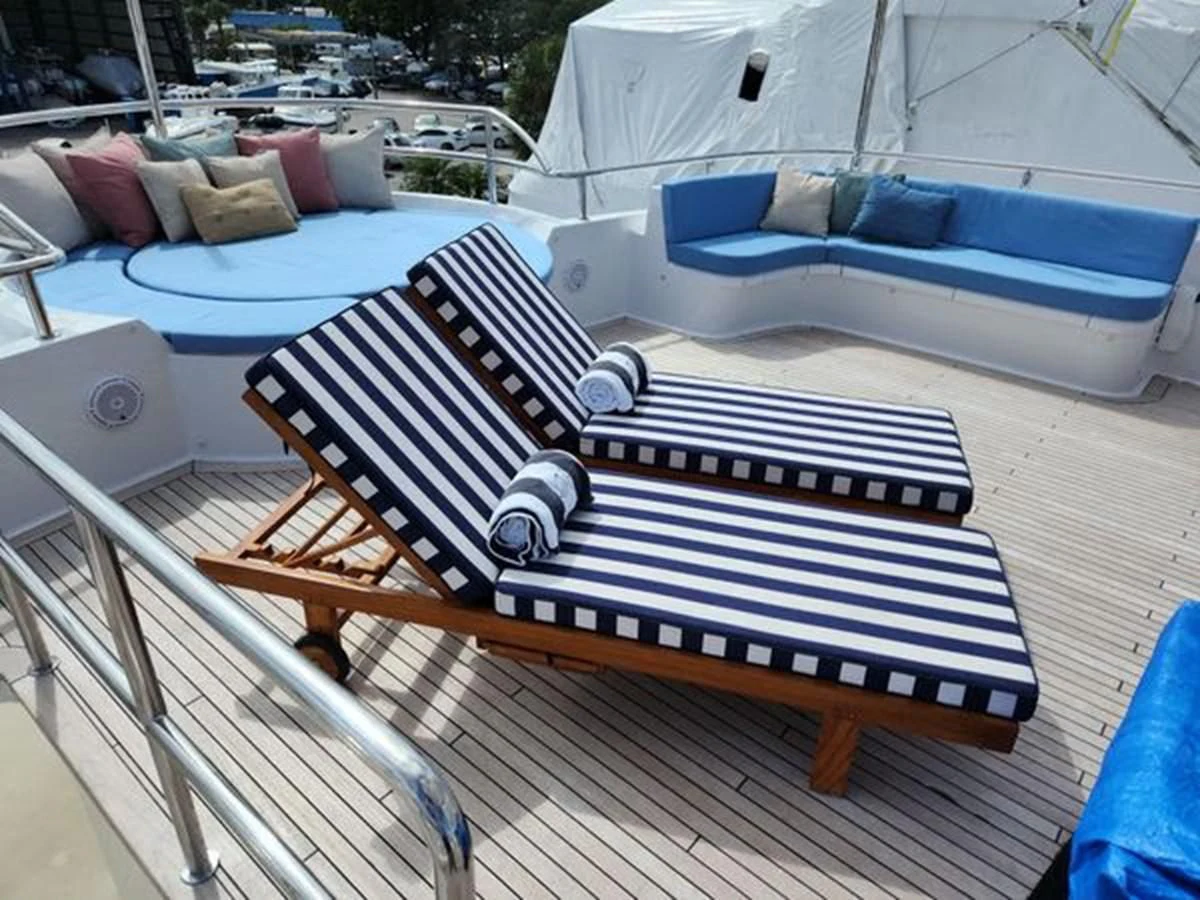 a bed on a deck aboard ISLAND HEIRESS Yacht for Charter