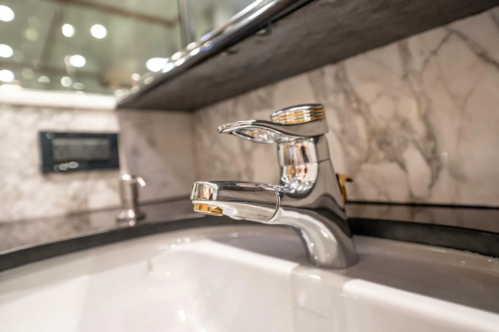 a sink with a faucet aboard ISLAND HEIRESS Yacht for Charter