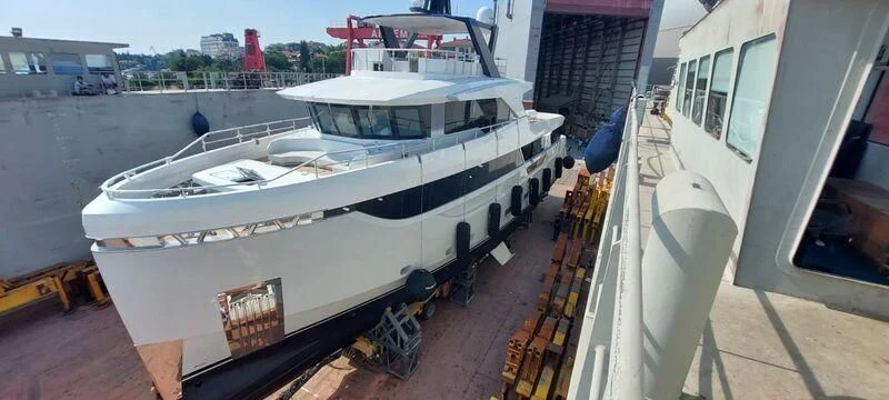 a boat on a dock aboard EBYSHINE Yacht for Sale