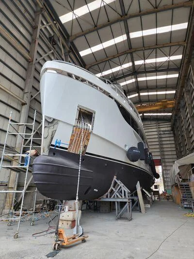 a large metal machine in a factory aboard EBYSHINE Yacht for Sale