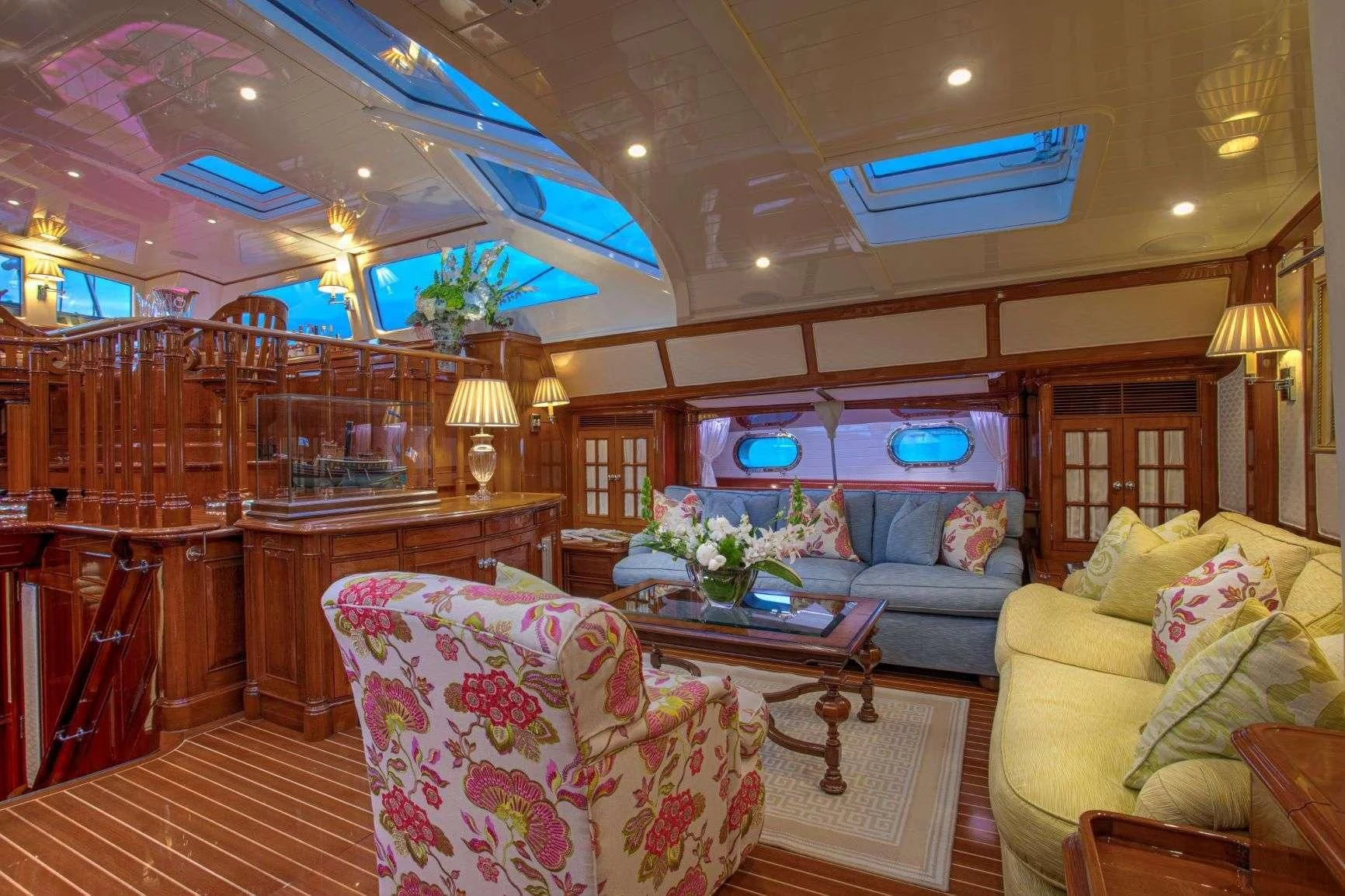 a living room with a couch and a table aboard WHISPER Yacht for Sale