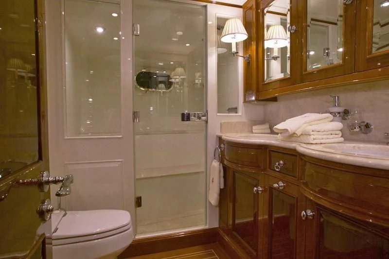 a bathroom with a sink and toilet aboard WHISPER Yacht for Sale