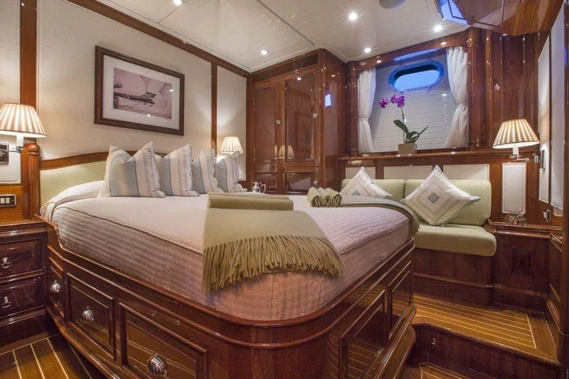a large bed in a hotel room aboard WHISPER Yacht for Sale