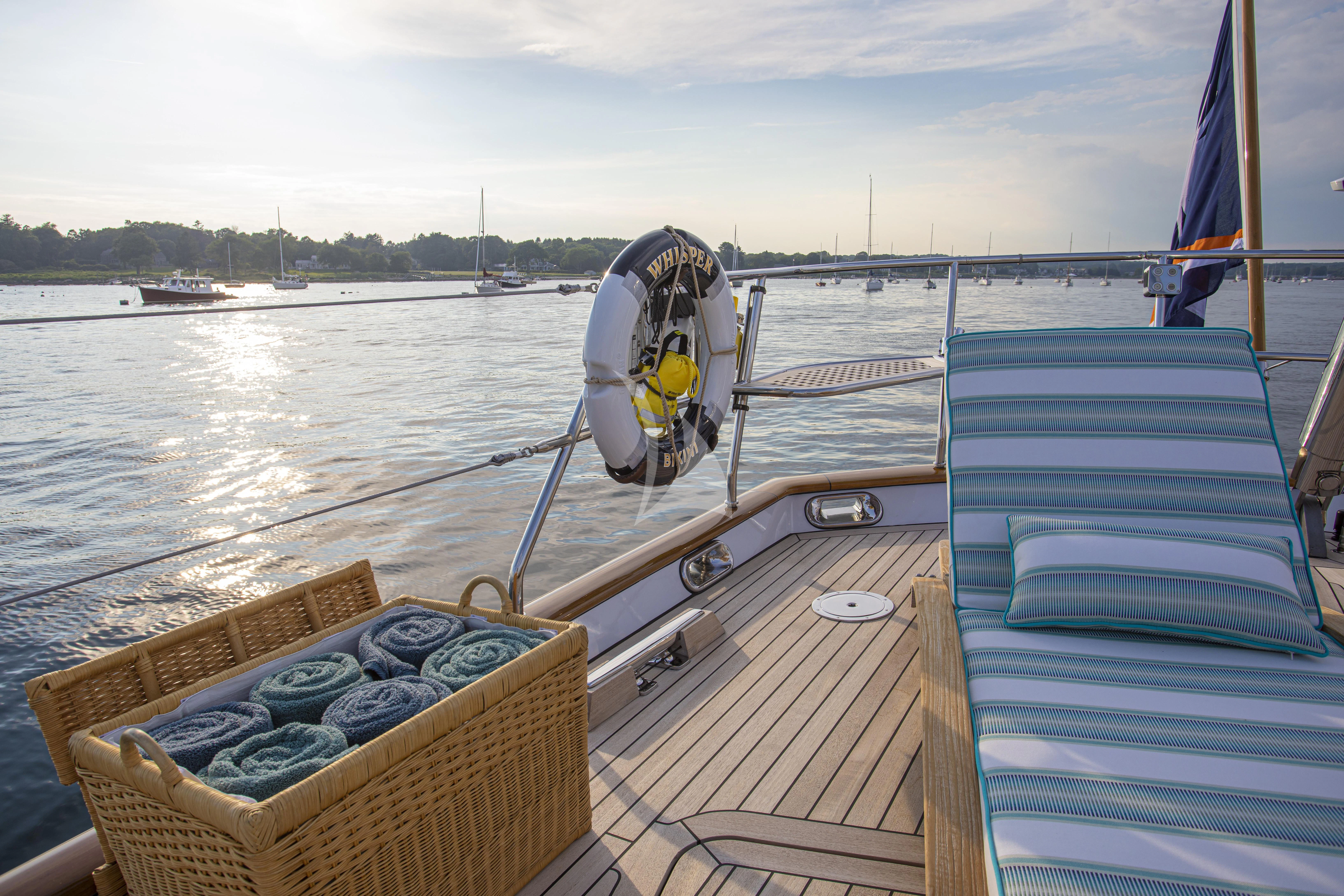 a boat with a basket on the front aboard WHISPER Yacht for Sale