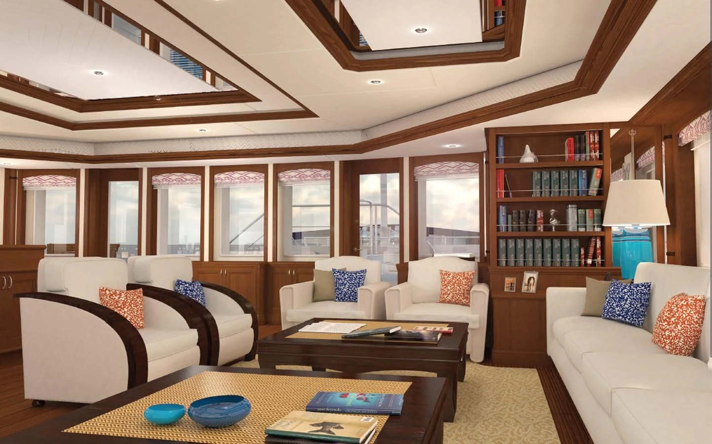 a living room with a table and couches aboard SIMON FRASER Yacht for Sale