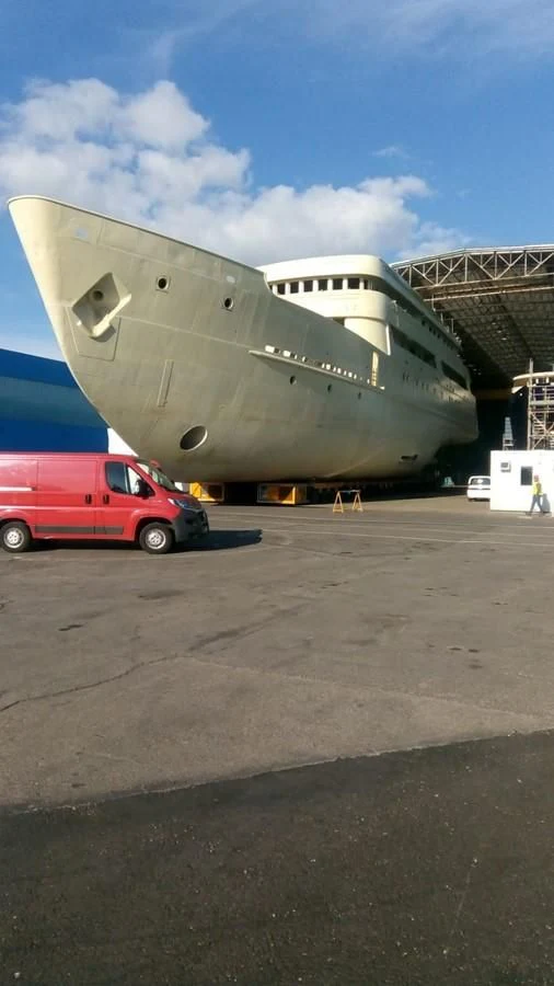 a large airplane in a hangar aboard SIMON FRASER Yacht for Sale