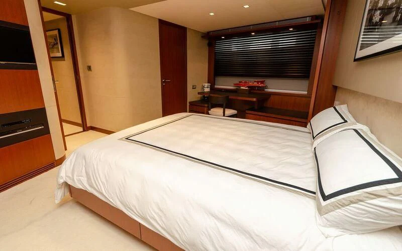 a bed in a hotel room aboard NEW VOGUE Yacht for Sale