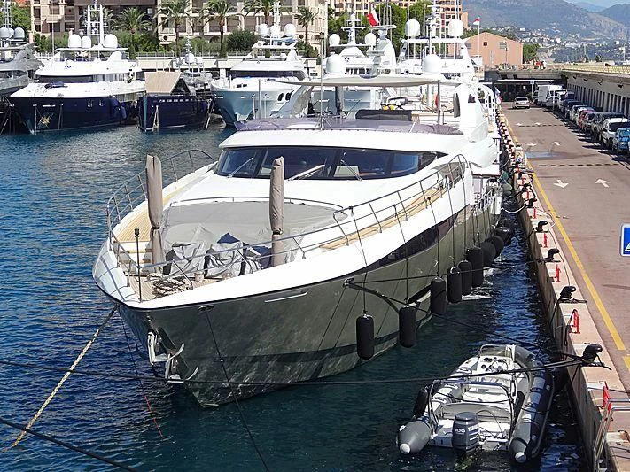 a boat docked at a pier aboard NEW VOGUE Yacht for Sale
