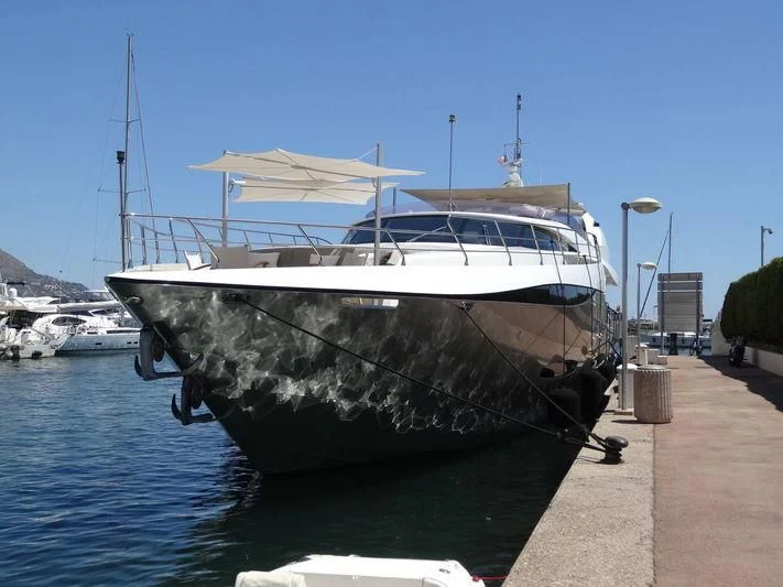 a boat docked at a pier aboard NEW VOGUE Yacht for Sale