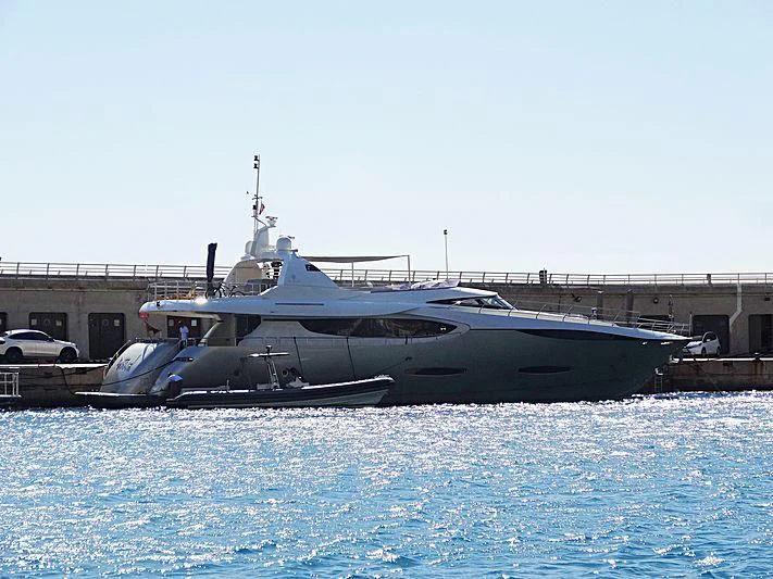 a boat docked at a pier aboard NEW VOGUE Yacht for Sale