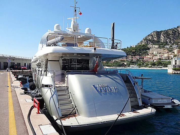 a boat docked at a pier aboard NEW VOGUE Yacht for Sale