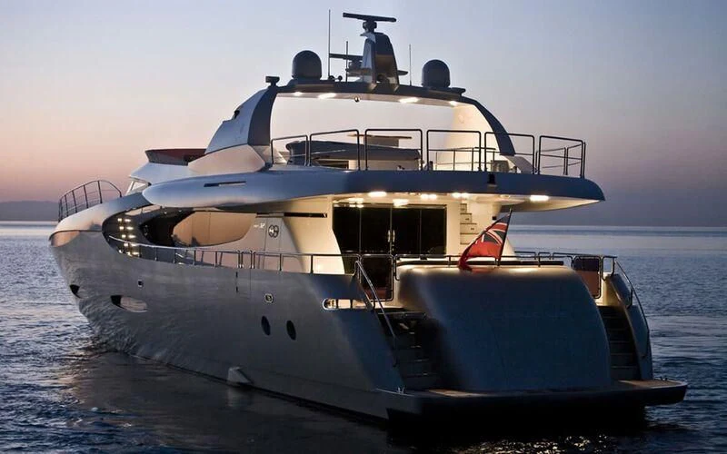 a large white boat on the water aboard NEW VOGUE Yacht for Sale