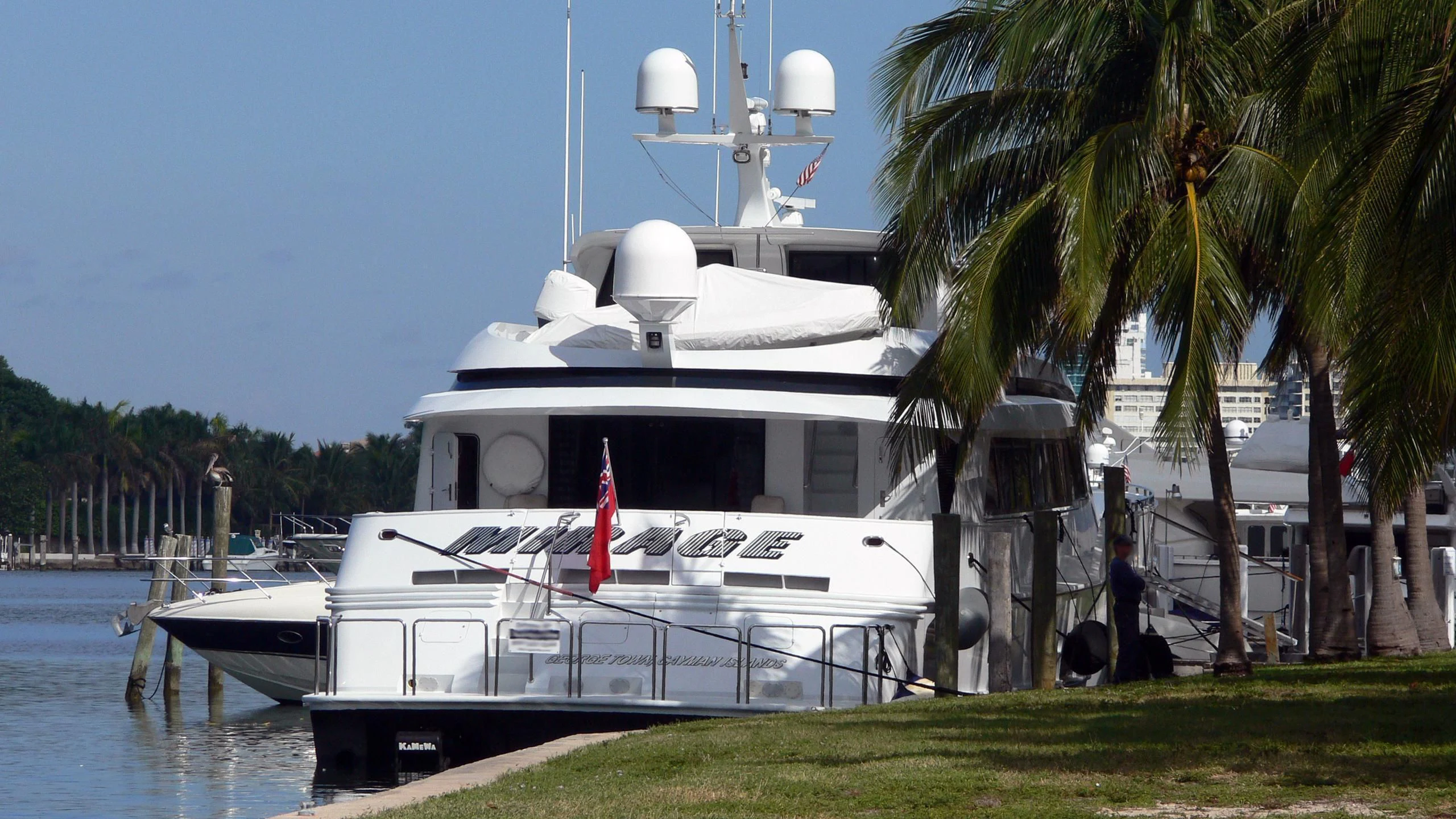a boat docked at a pier aboard MIRAGE Yacht for Sale