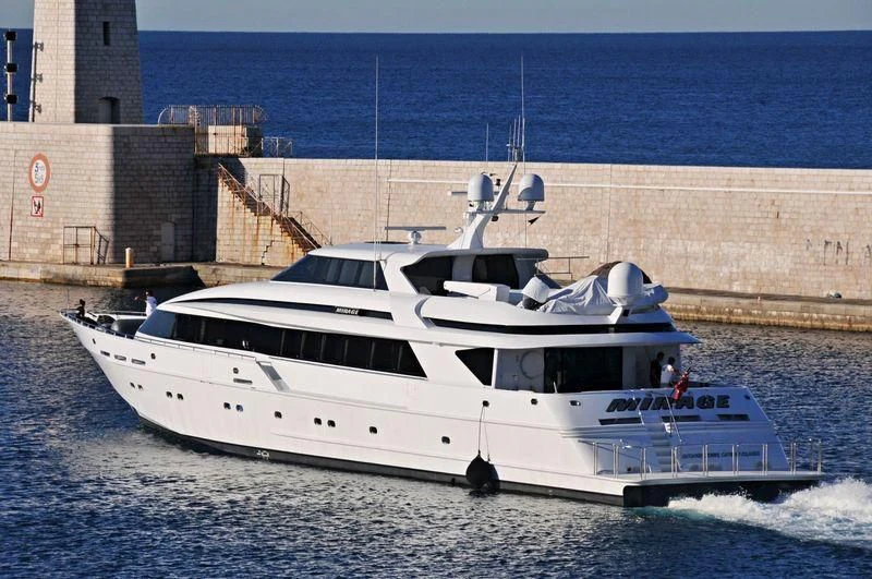 a white yacht in the water aboard MIRAGE Yacht for Sale