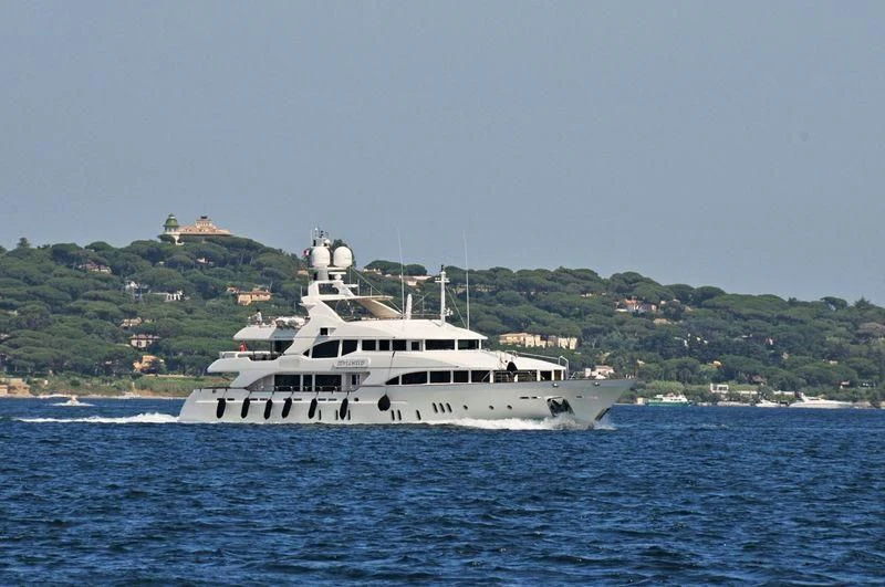 a white boat in the water aboard SEASCAPE V Yacht for Sale