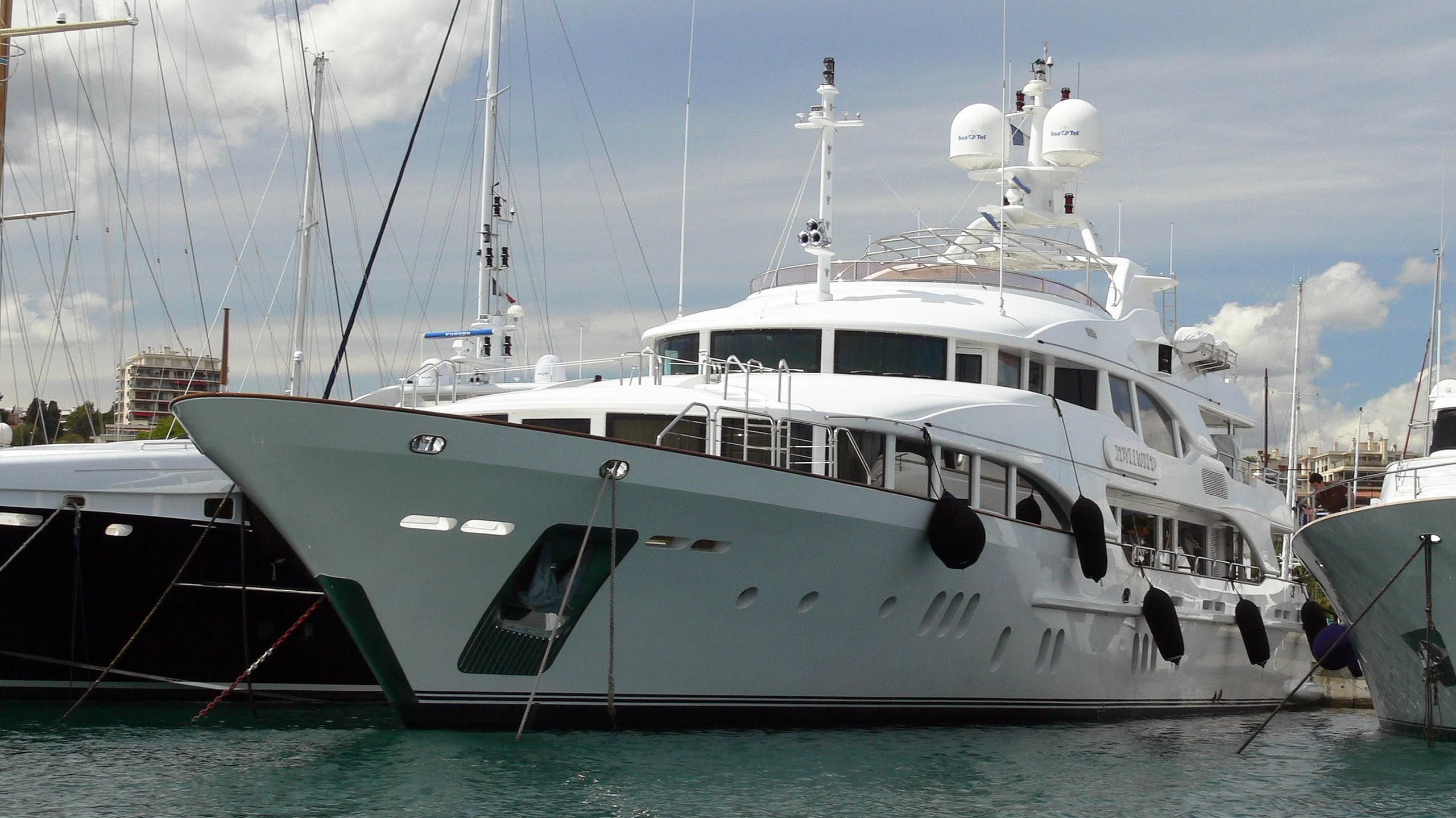 a white yacht in the water aboard SEASCAPE V Yacht for Sale