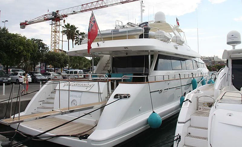 a boat docked at a pier aboard GREAT HOPE Yacht for Sale