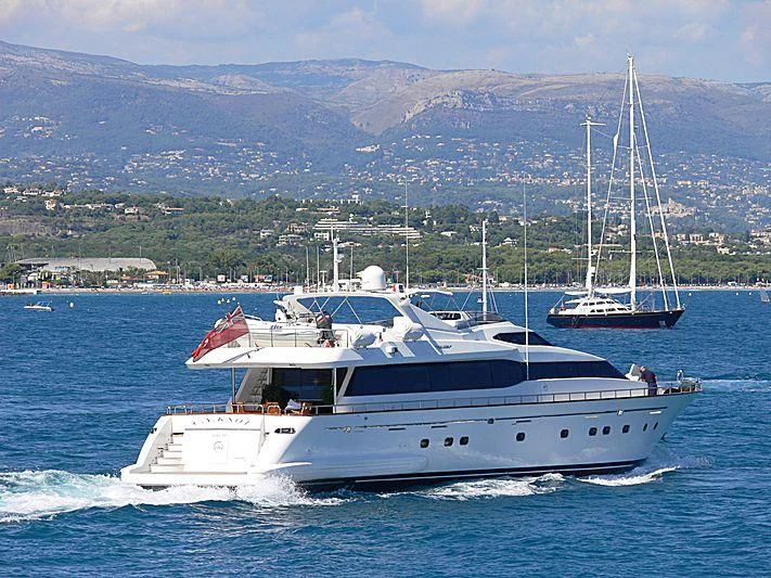 a couple of boats on the water aboard GREAT HOPE Yacht for Sale