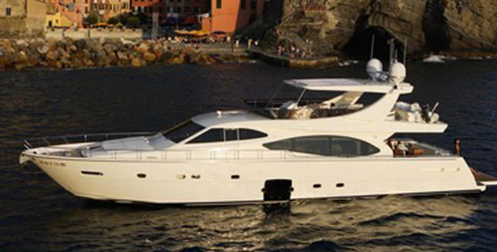 a white yacht on the water aboard ARGO Yacht for Sale