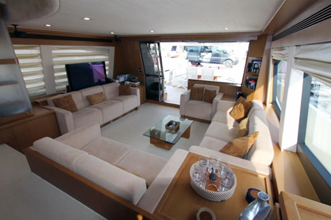 a living room with a large window aboard ARGO Yacht for Sale