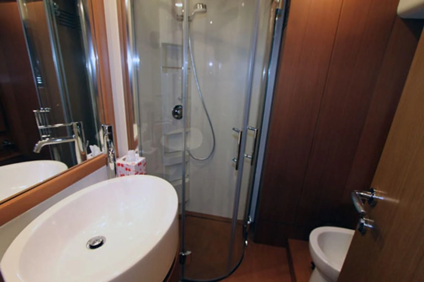 a bathroom with a shower and sink aboard ARGO Yacht for Sale