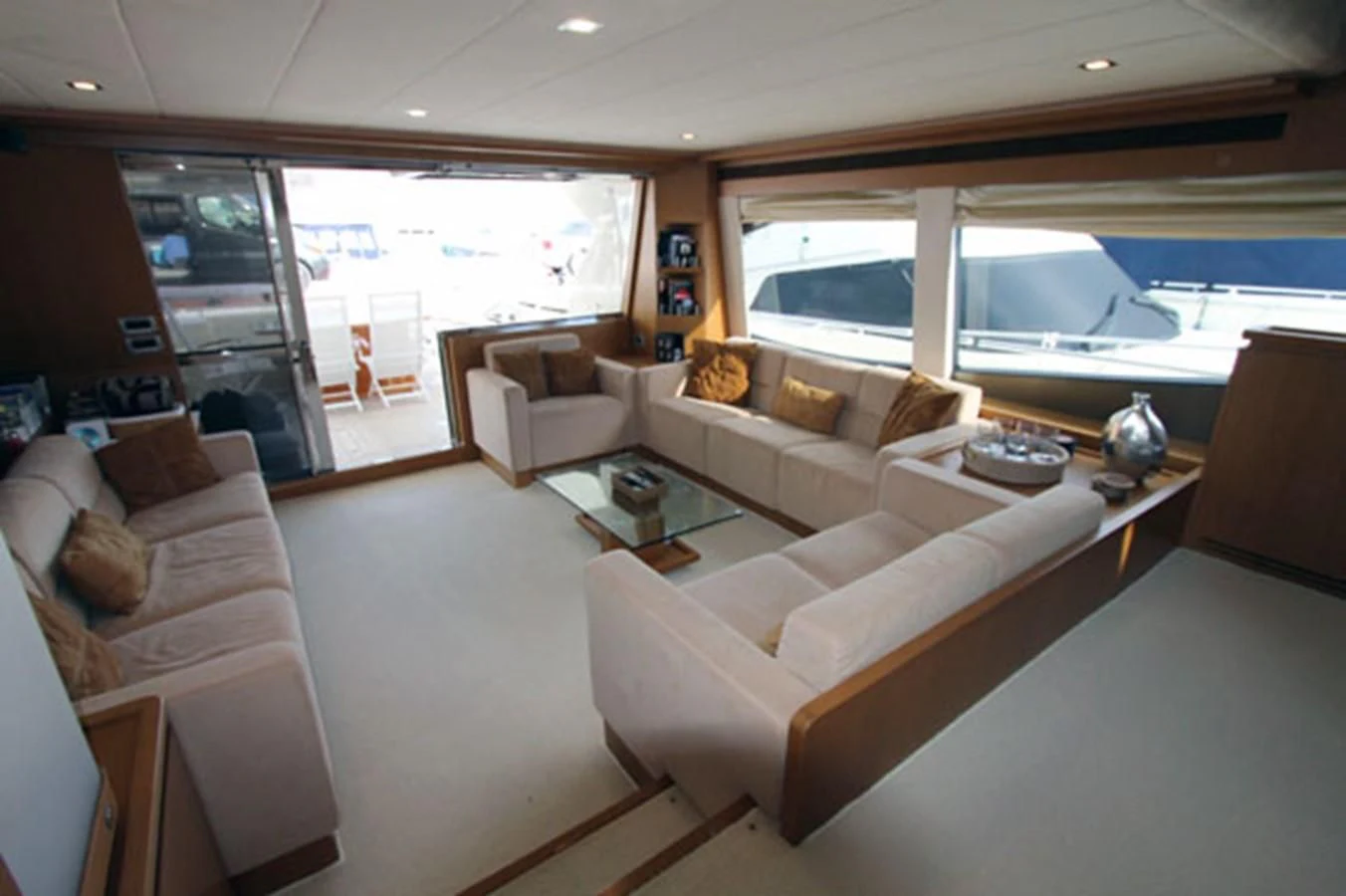 a living room with a large window aboard ARGO Yacht for Sale