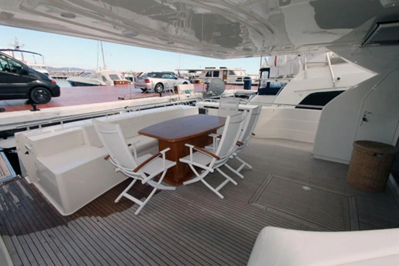 a room with a table and chairs aboard ARGO Yacht for Sale