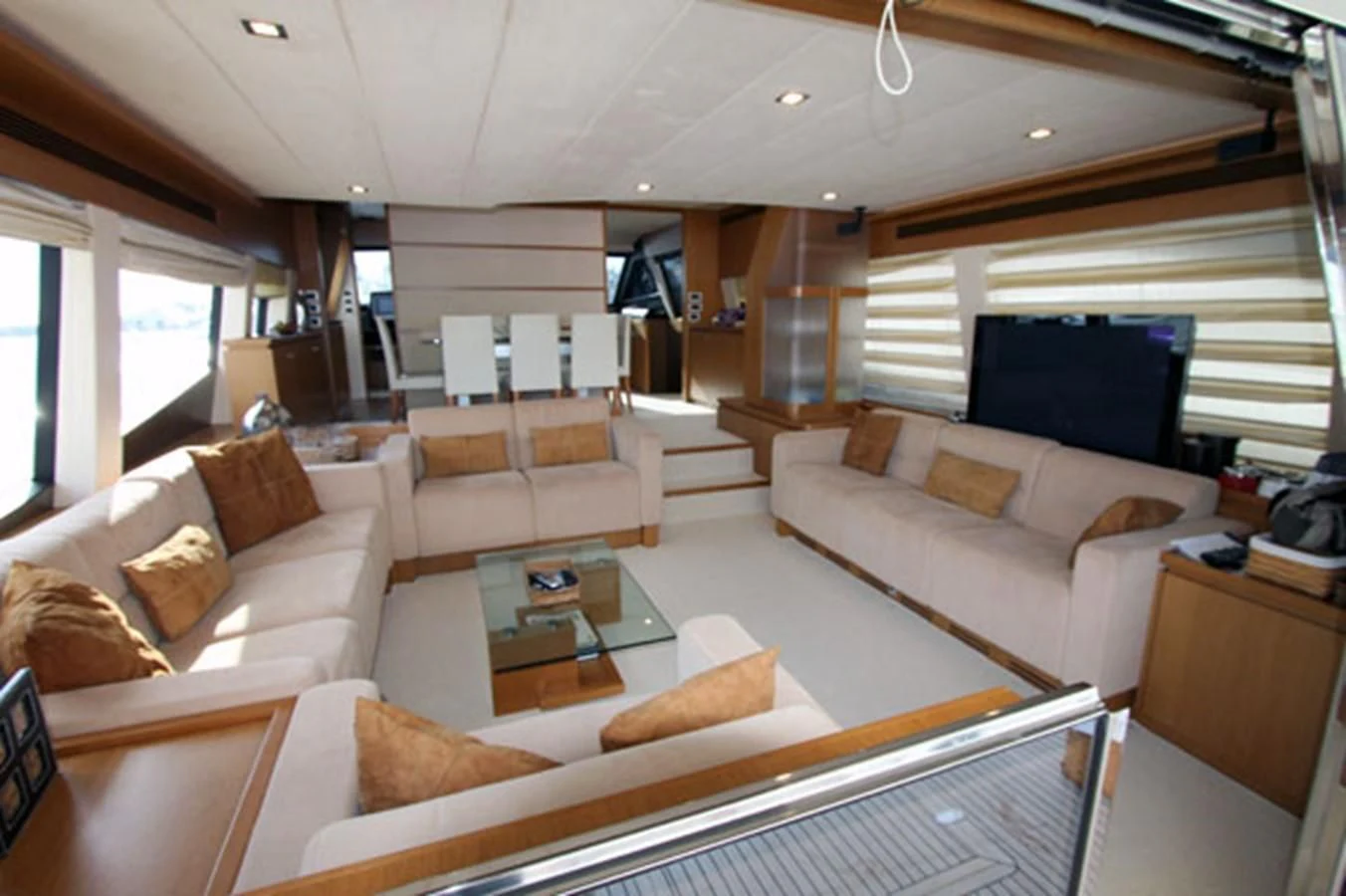 a living room with a couch and a coffee table aboard ARGO Yacht for Sale