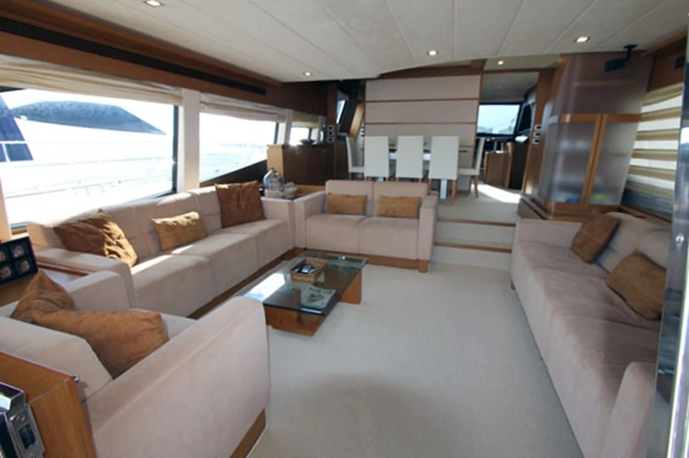 a living room with a couch and a coffee table aboard ARGO Yacht for Sale