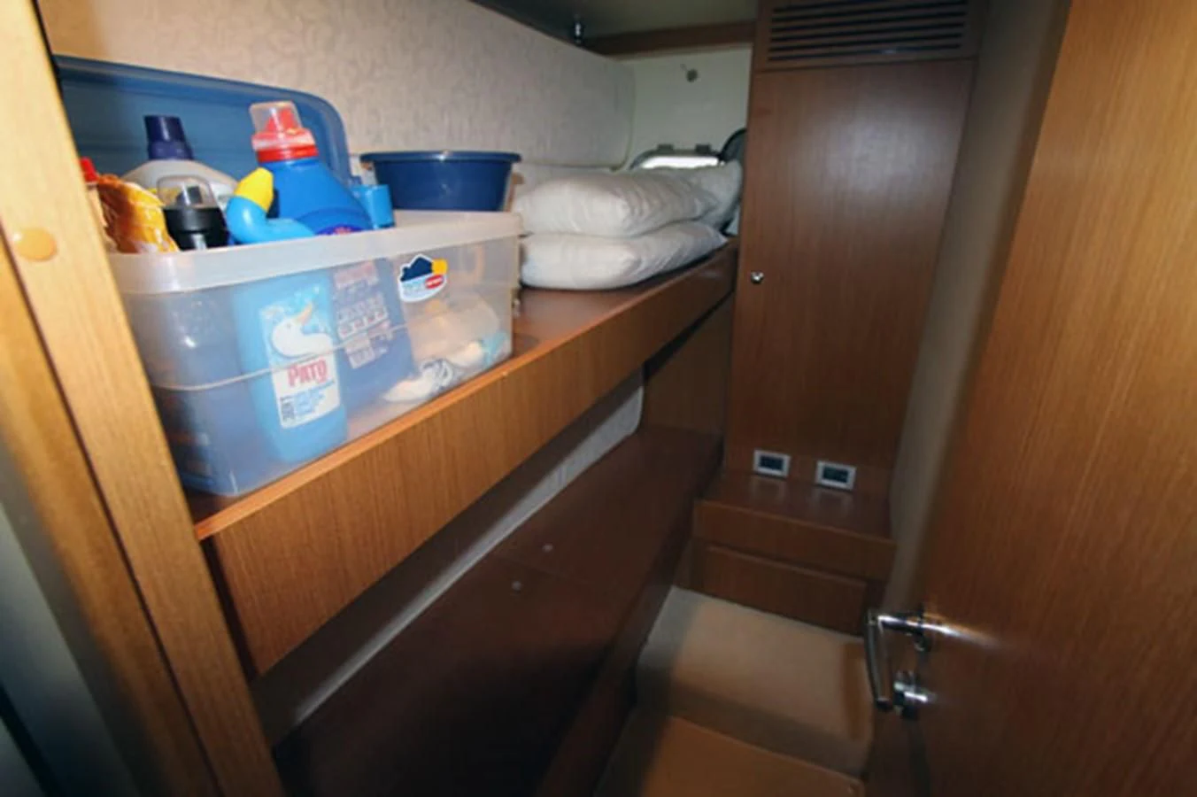 a cabinet with a sink and a shelf with food on it aboard ARGO Yacht for Sale