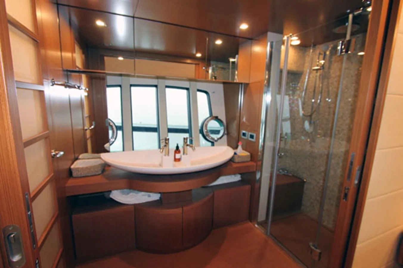 a bathroom with a large shower aboard ARGO Yacht for Sale