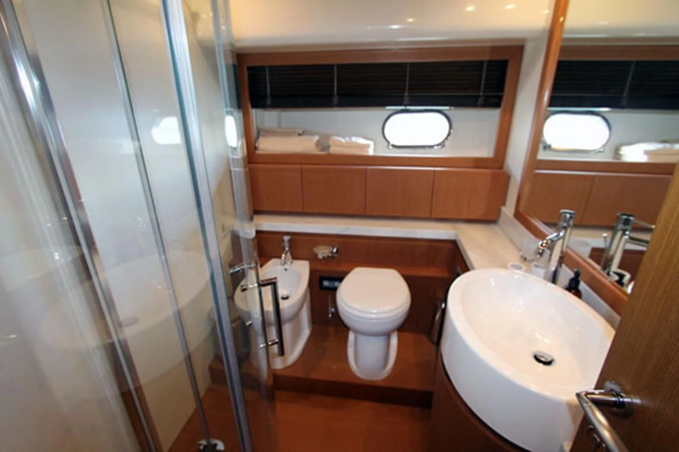 a bathroom with a sink toilet and a shower aboard ARGO Yacht for Sale