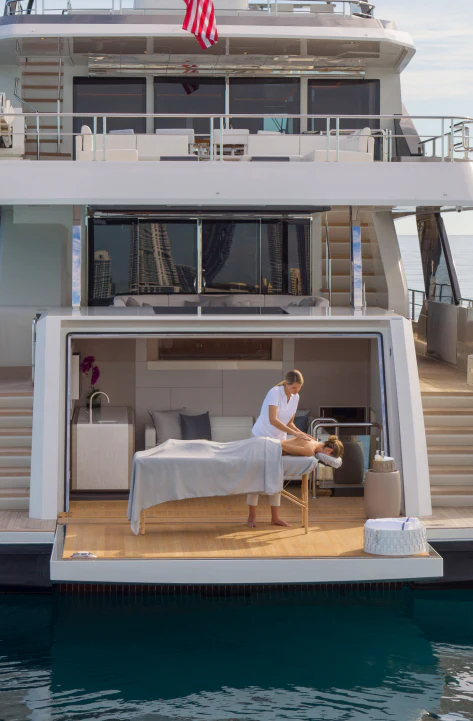 a person sitting on a chair in a pool aboard MÖBIUS Yacht for Sale
