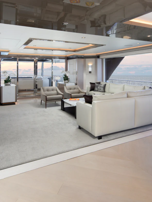 a living room with a large window aboard MÖBIUS Yacht for Sale