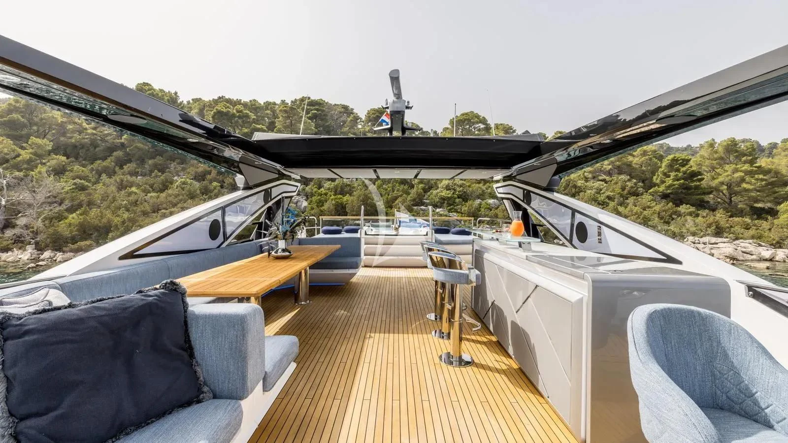 a deck with a deck and a boat on it aboard EXIT Yacht for Sale