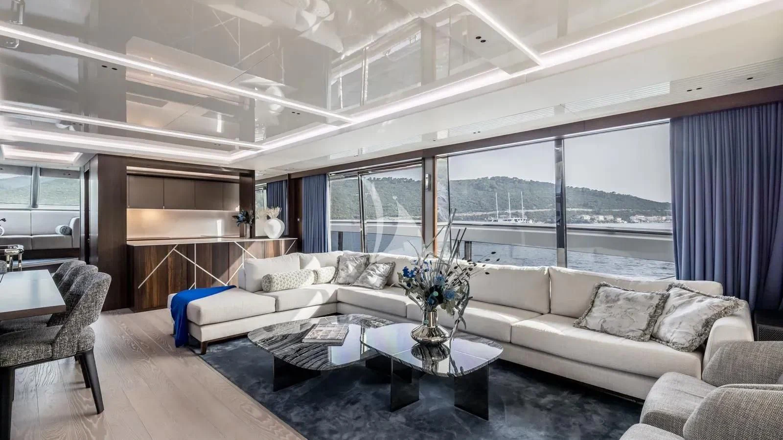 a living room with a large window aboard EXIT Yacht for Sale