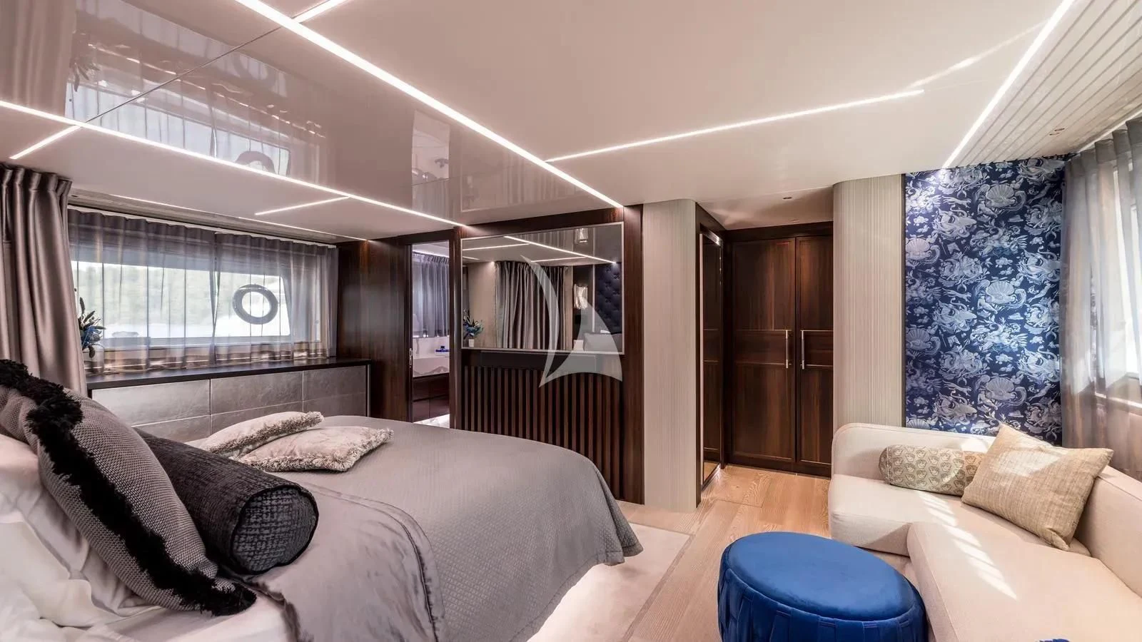 a bedroom with a large bed aboard EXIT Yacht for Sale