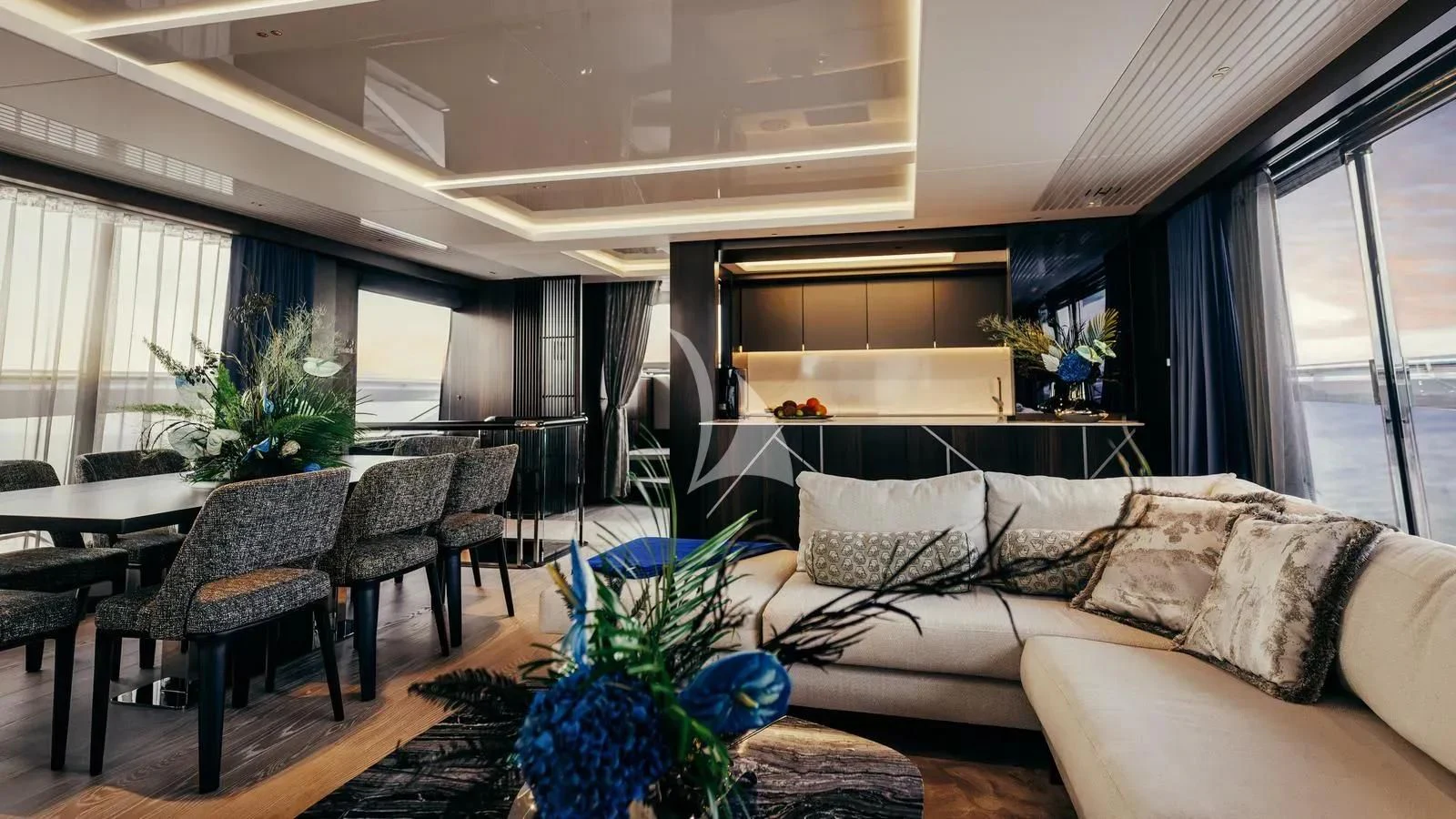 a living room with a couch and a table aboard EXIT Yacht for Sale