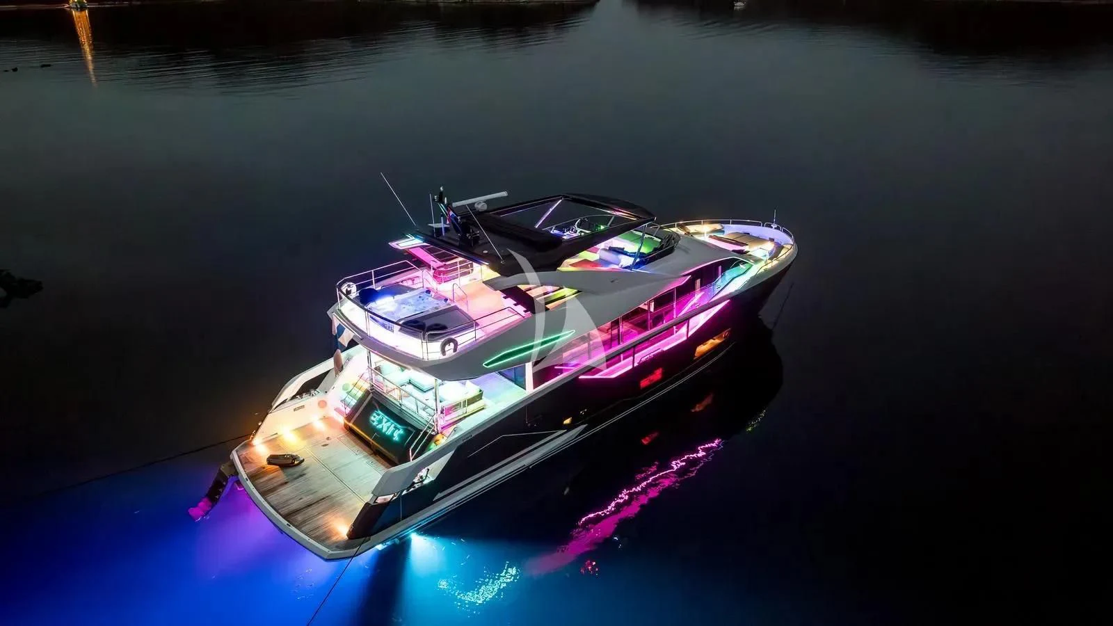 a car on the water aboard EXIT Yacht for Sale
