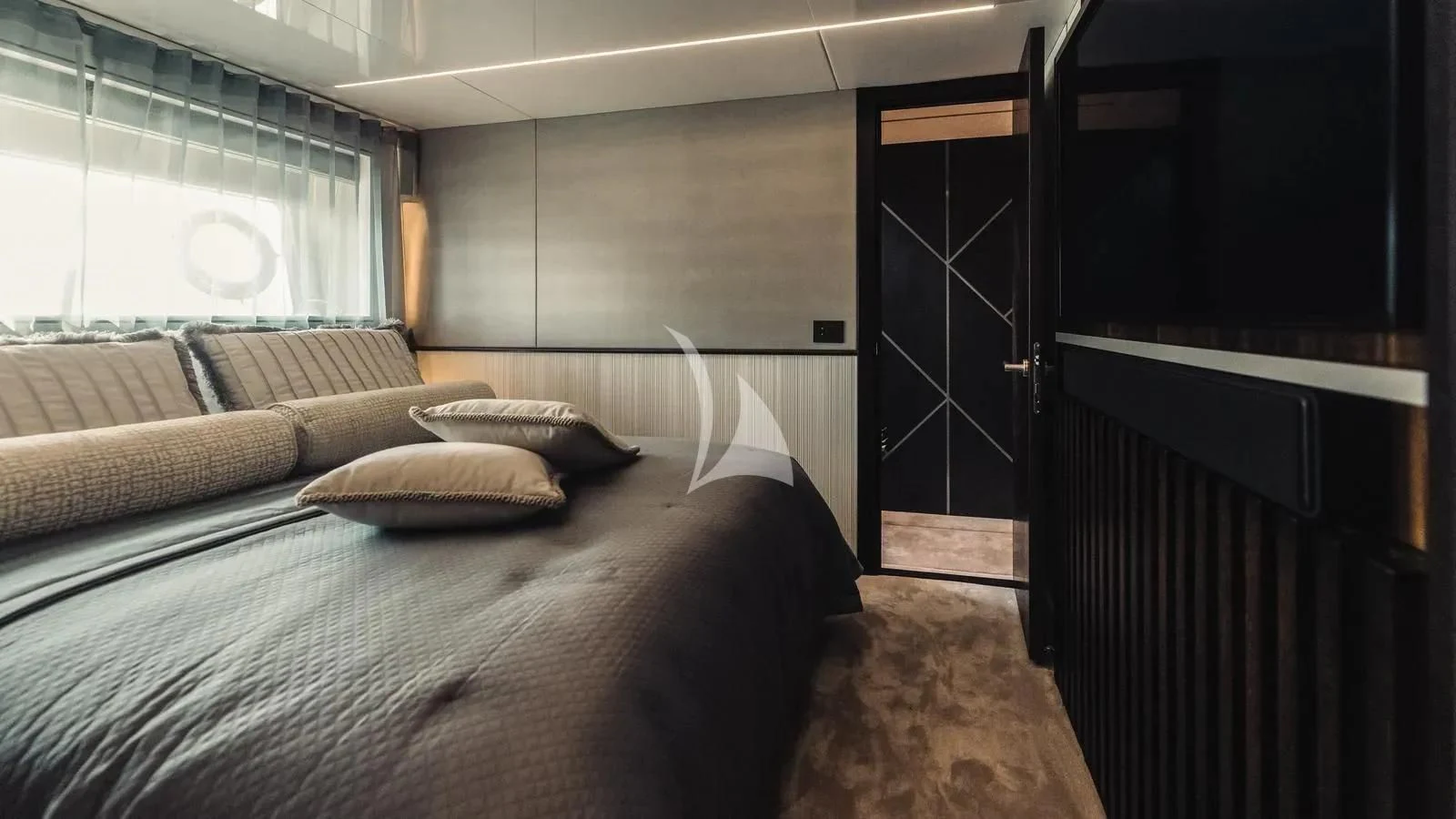 a bed in a room aboard EXIT Yacht for Sale
