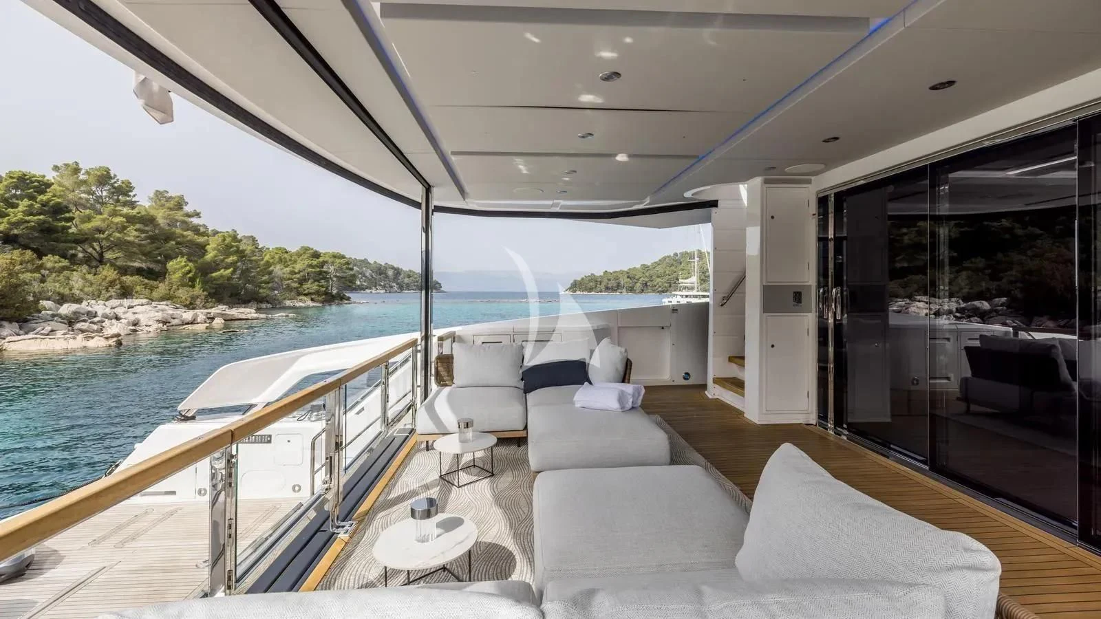 a large boat on the water aboard EXIT Yacht for Sale