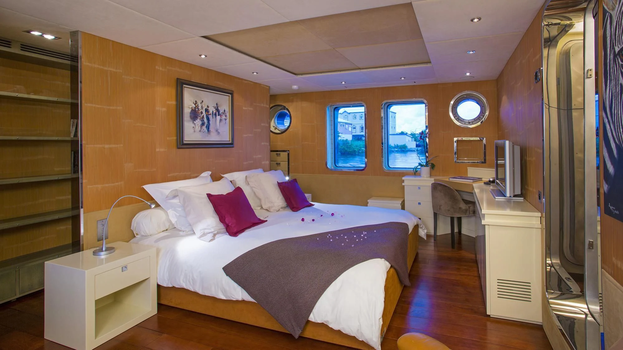 a bed in a room aboard PAOLYRE Yacht for Sale