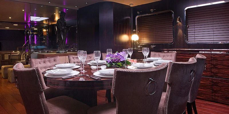 a dining table set for a dinner aboard PAOLYRE Yacht for Sale