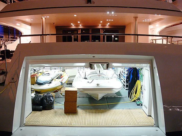 a room with a couple of beds aboard MY FALCON Yacht for Sale