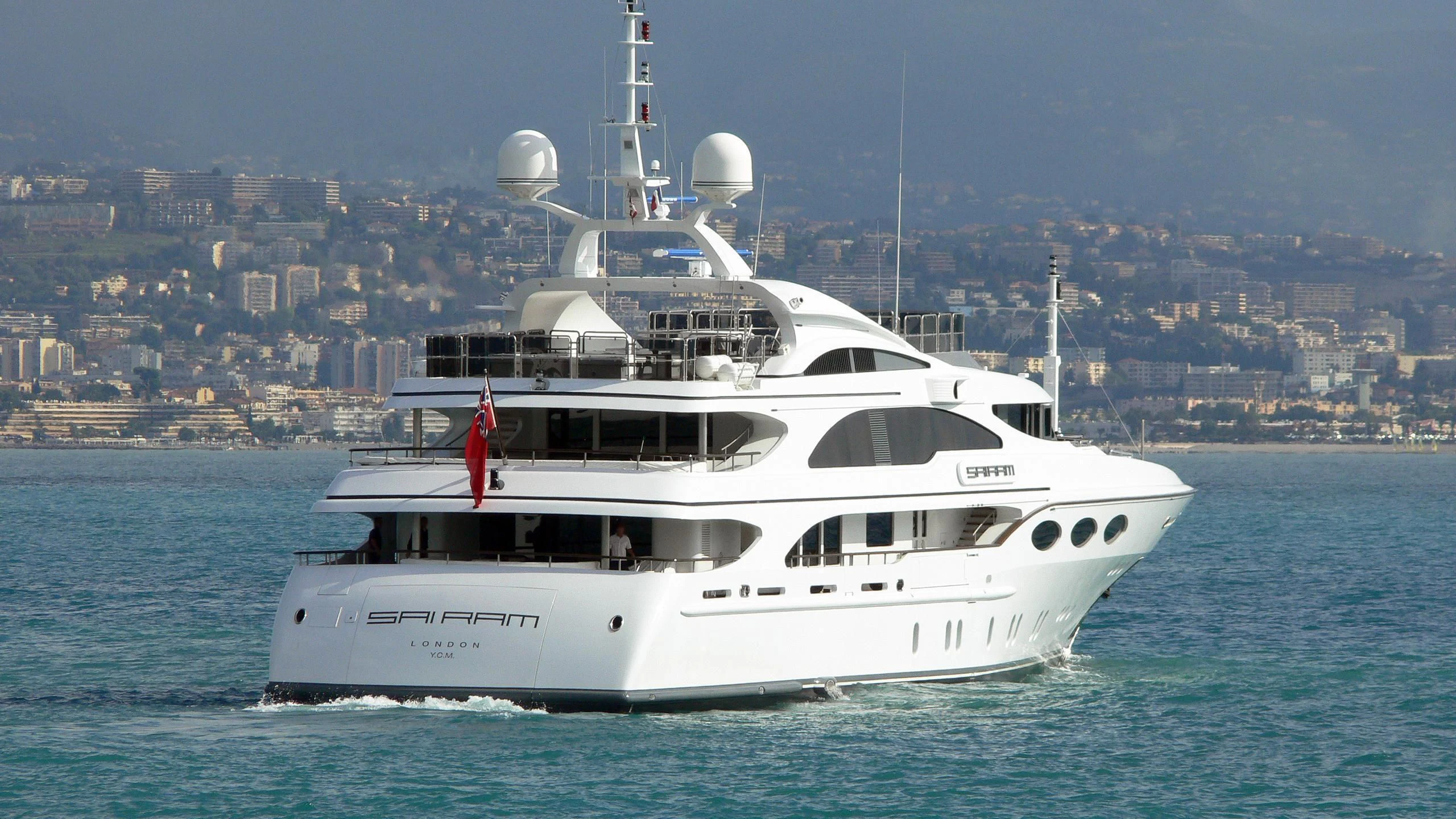 a white yacht in the water aboard MY FALCON Yacht for Sale