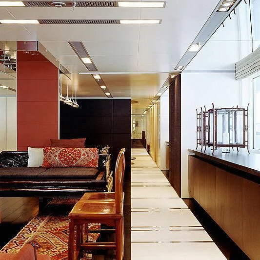 a room with a couch and a table aboard MY FALCON Yacht for Sale